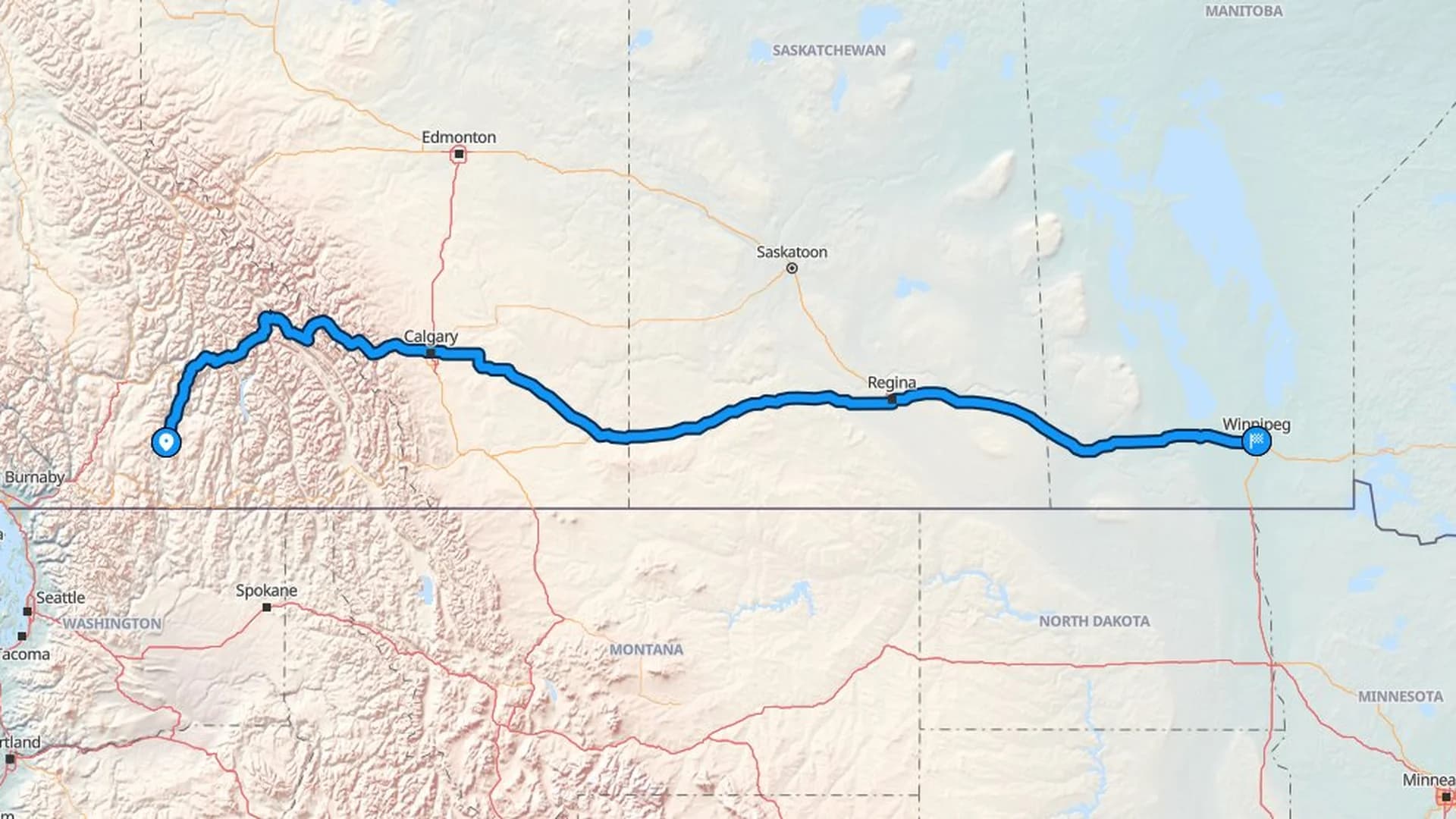 Map showing the Kelowna to Winnipeg car shipping route across four Canadian provinces