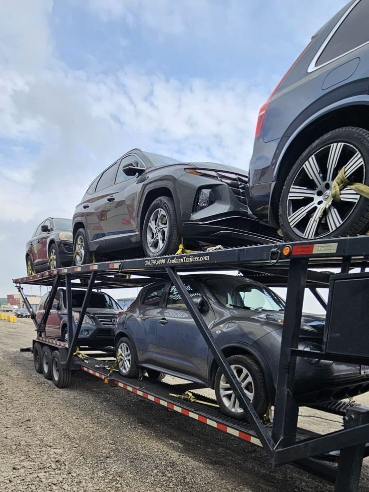 Car carrier truck driving through Alberta in winter