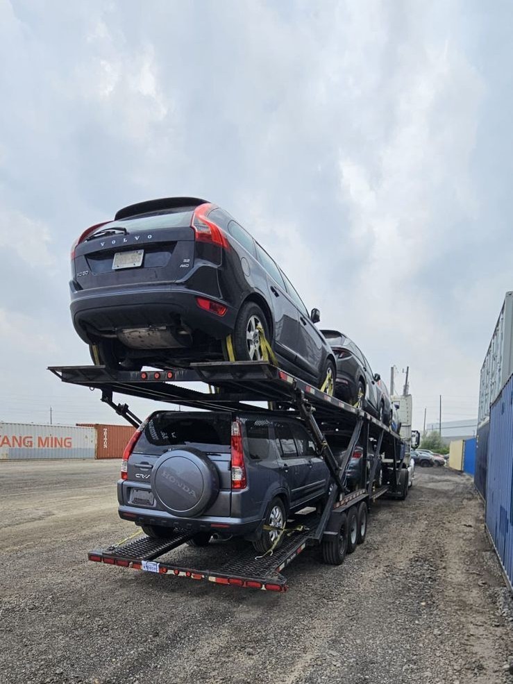 Auto shipping carrier loading vehicles in Saskatchewan