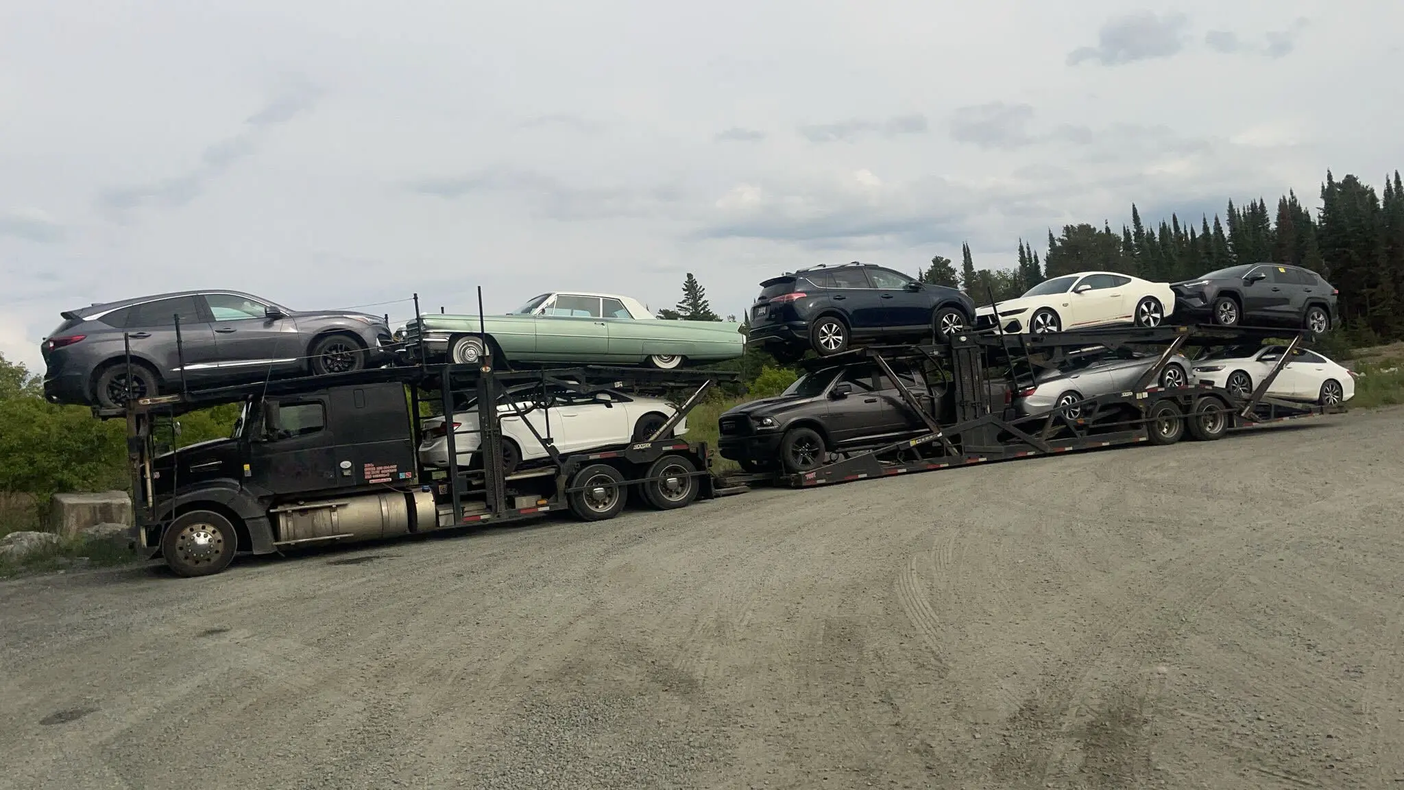 Auto transport truck on rural Manitoba road