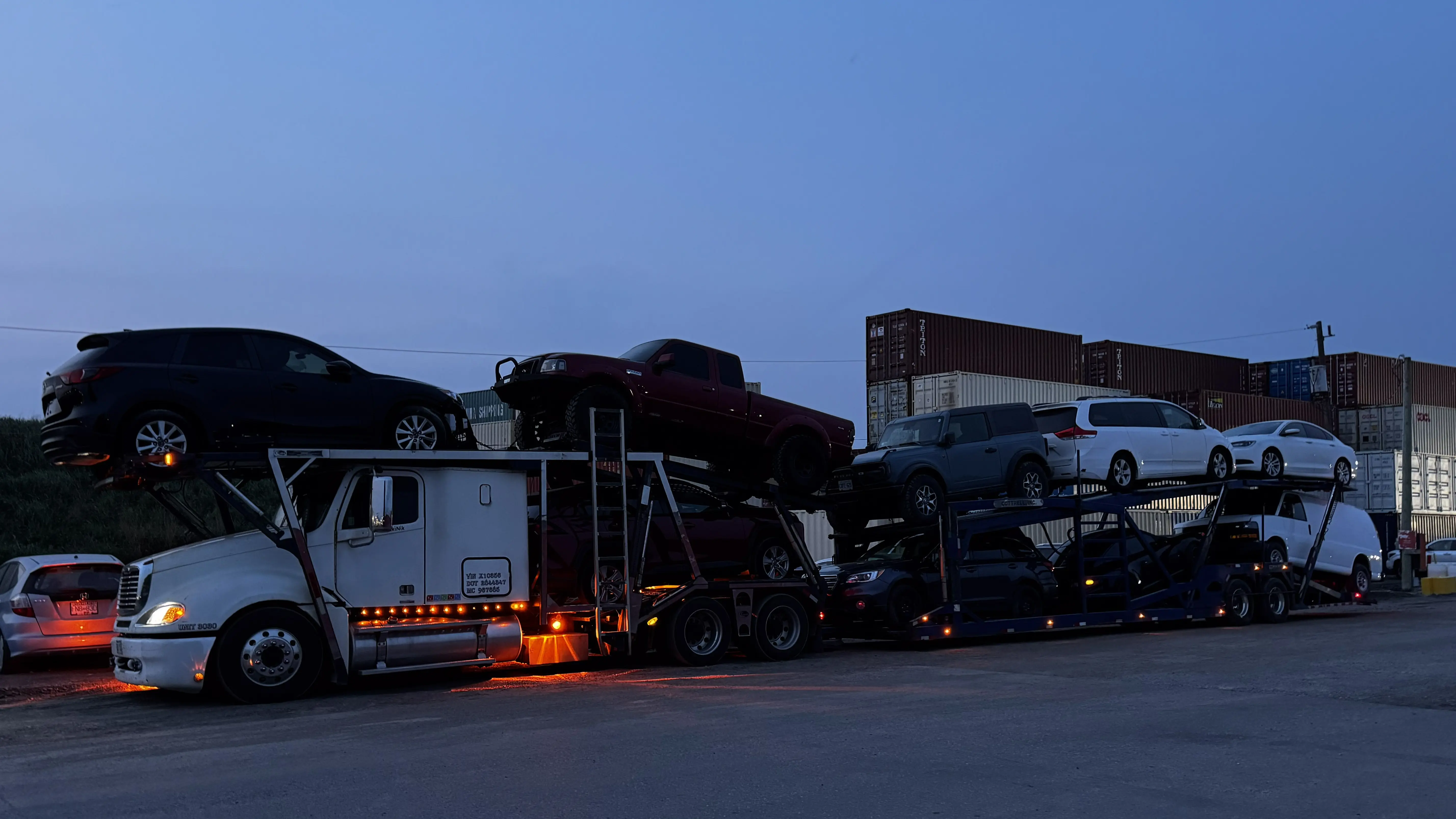 Auto shipping carrier loading vehicles in Saskatchewan
