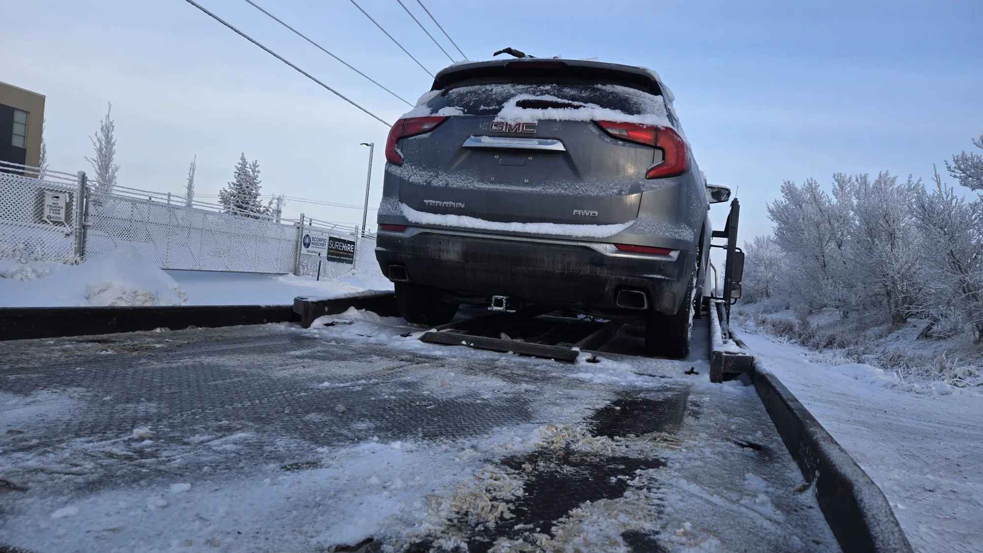 Vehicle being transported from Ontario to British Columbia on an open carrier