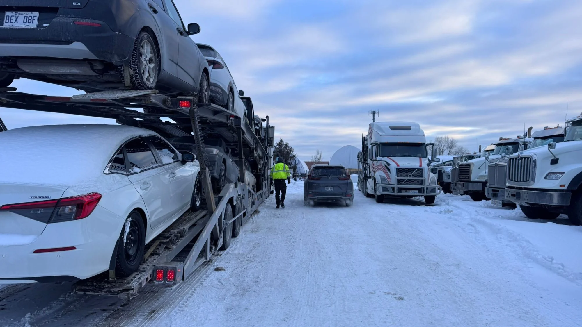 Vehicle being transported from Brampton to Toronto through the GTA corridor
