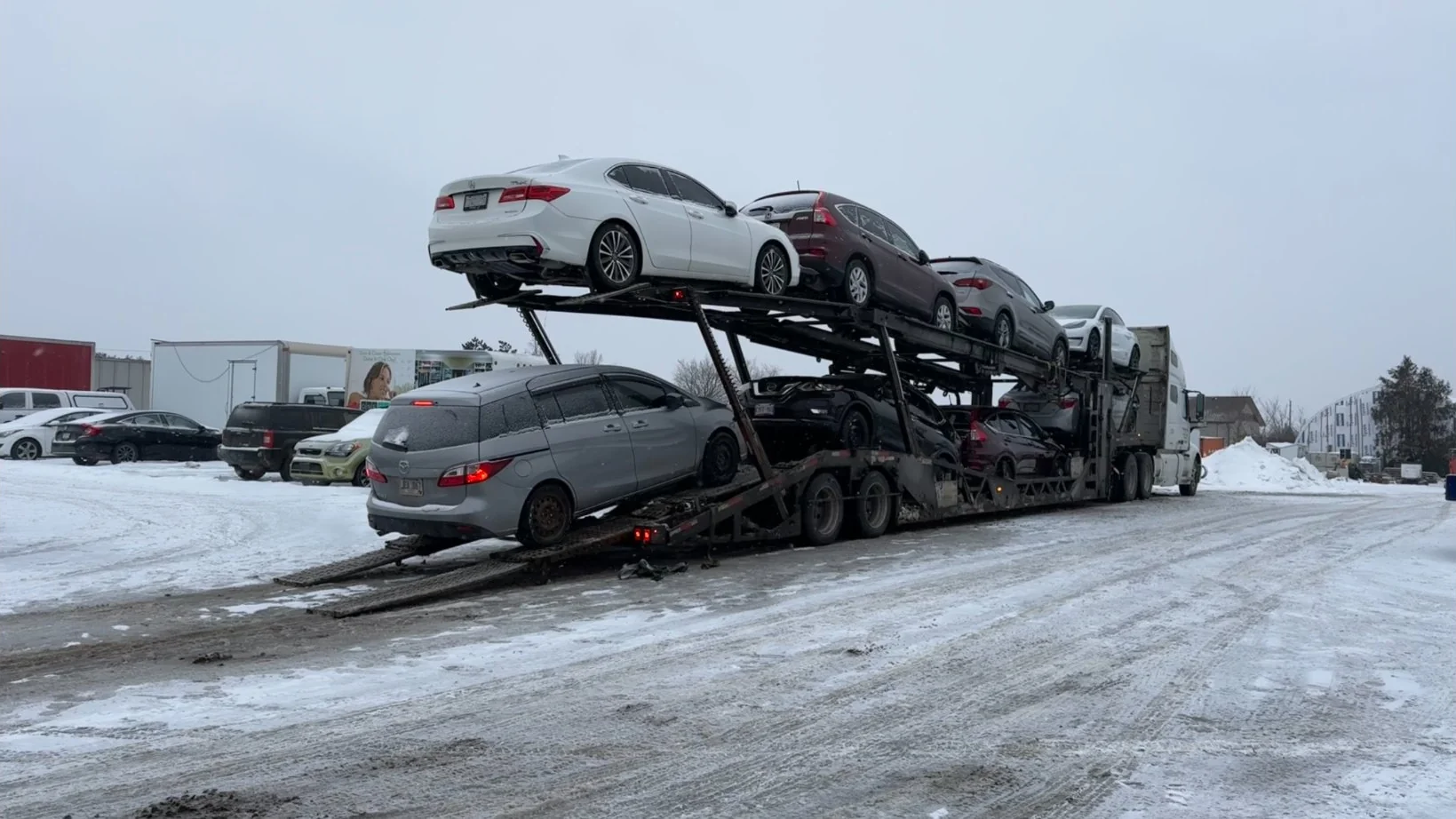 Vehicle being transported from Brampton to Vaughan through the GTA corridor