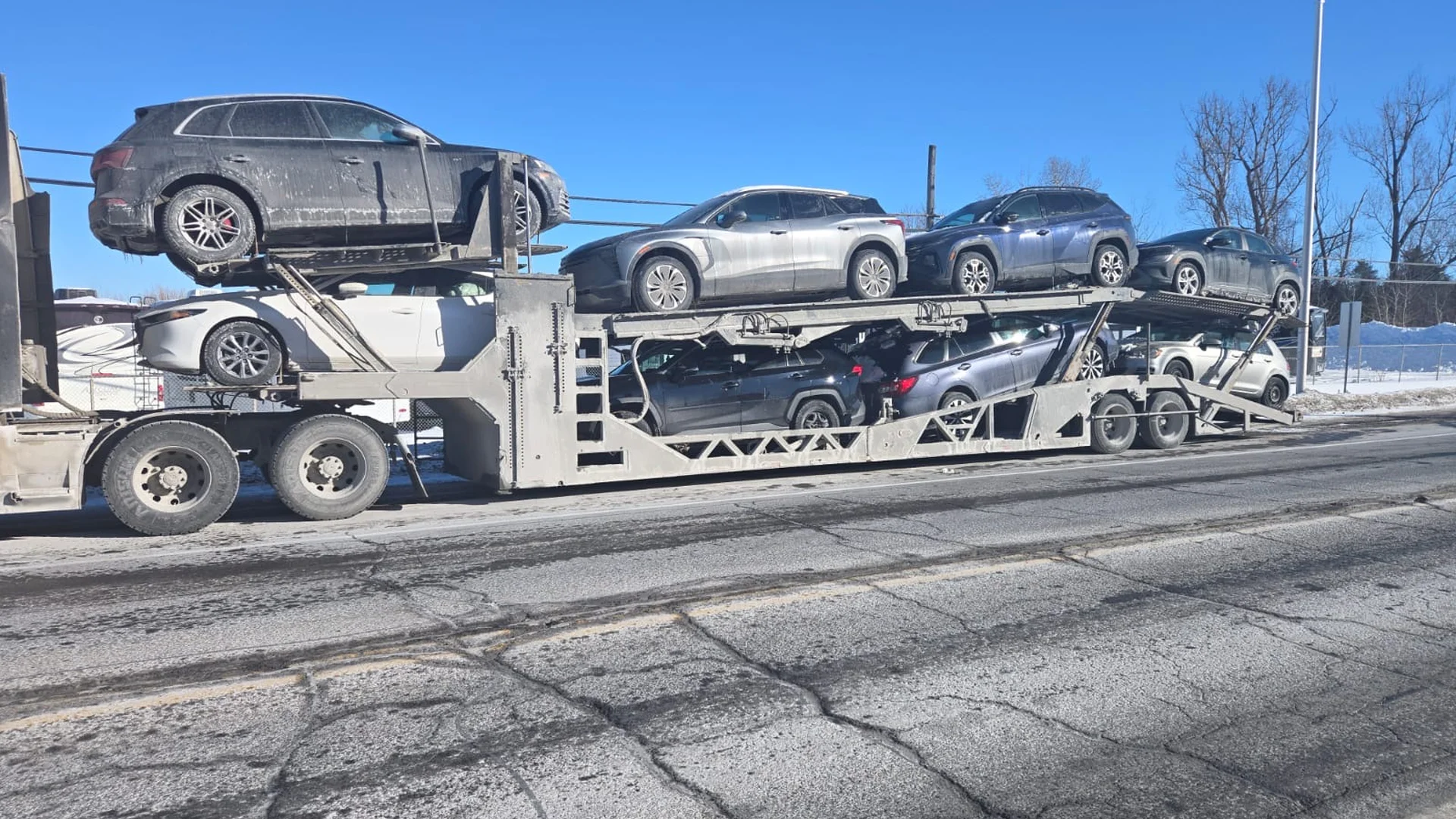 Vehicle being transported from Calgary to London across the Prairies and Canadian Shield