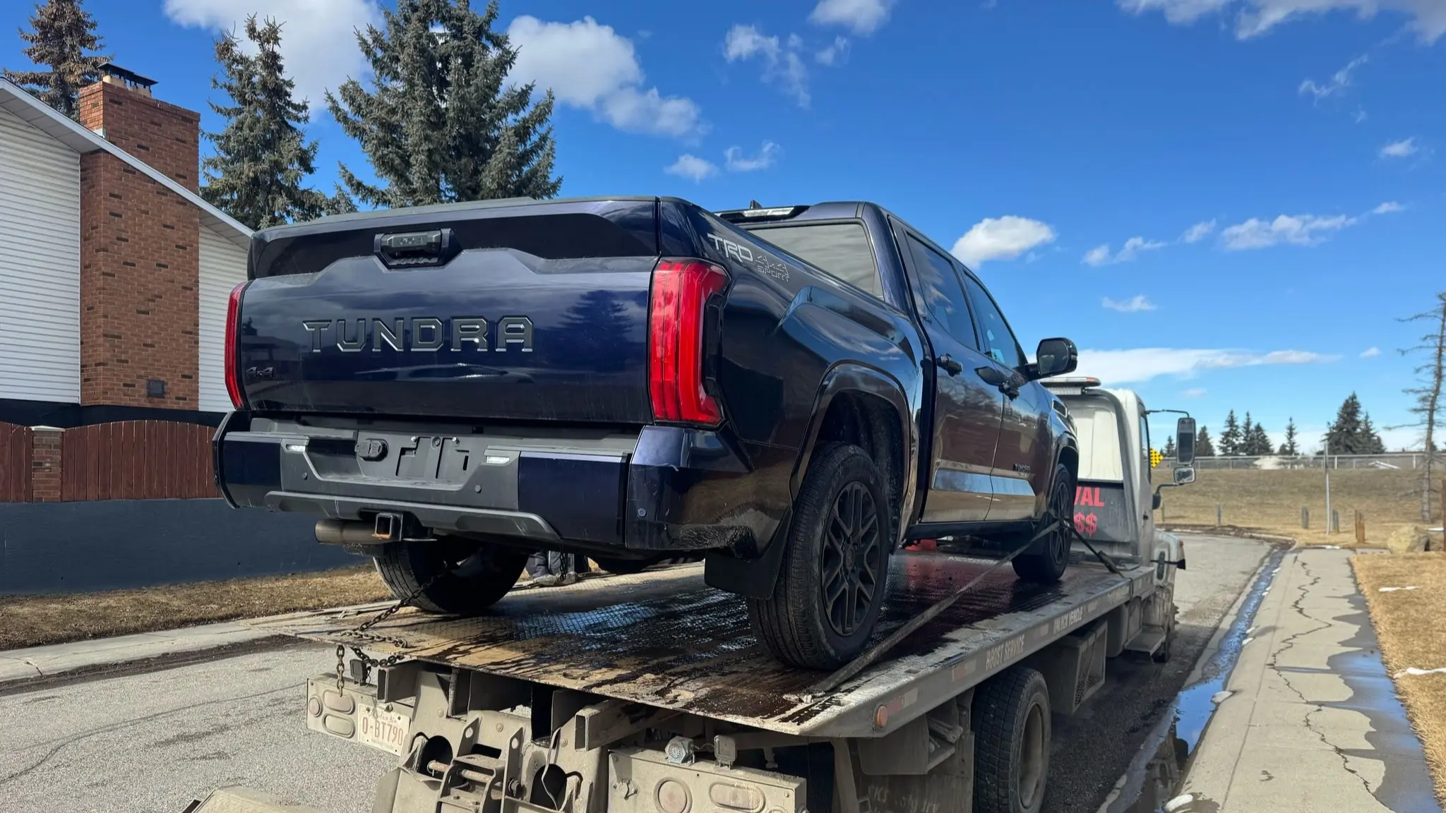 Enclosed vehicle hauler heading to Vancouver