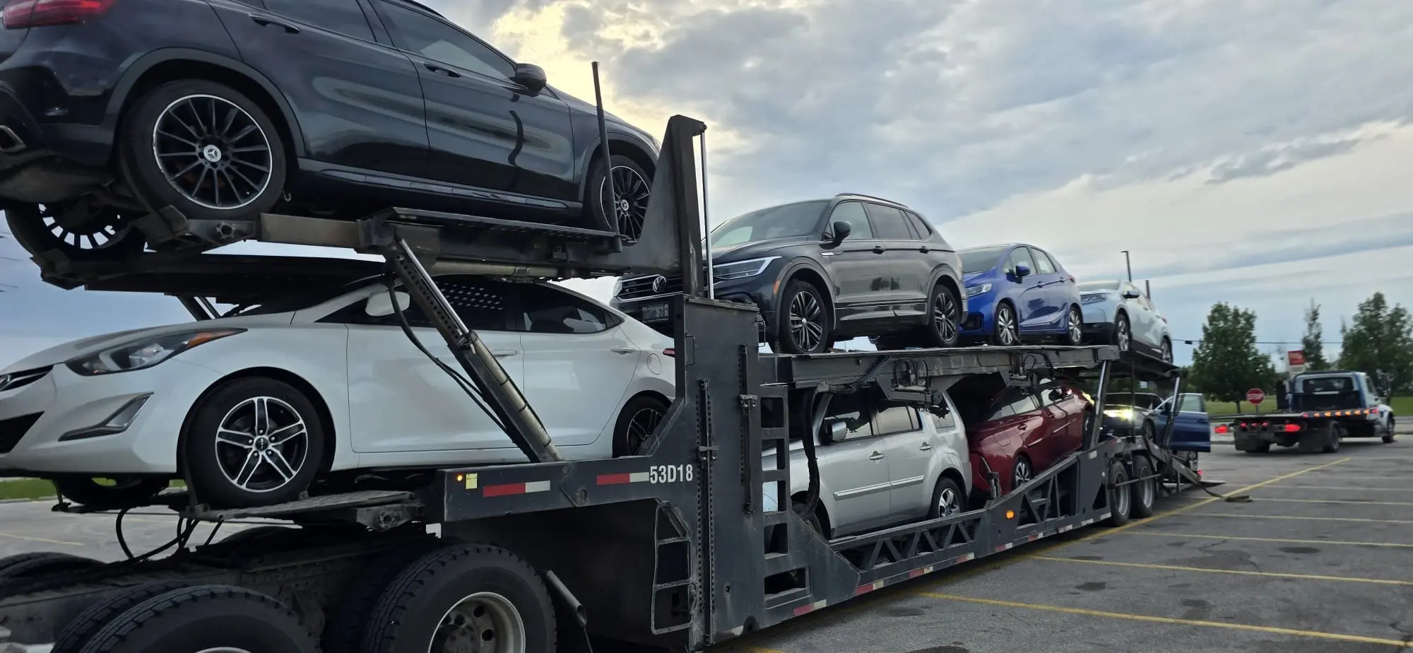 Auto transport trailer traveling across Canada to Regina