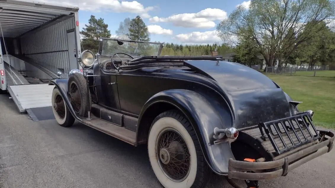 Car carrier hauling vehicles to Saskatoon