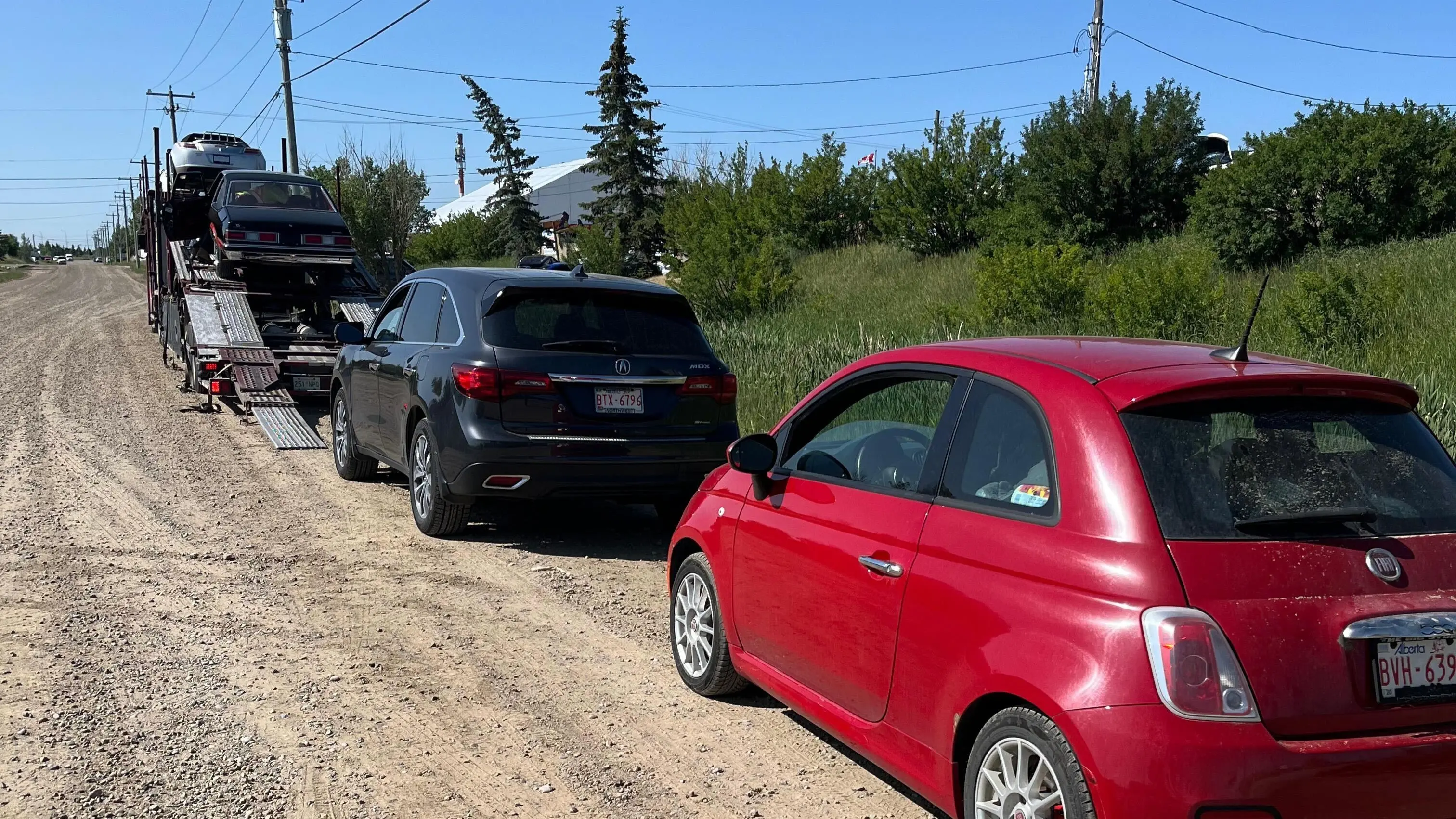 Vehicle shipping truck traveling to Alberta