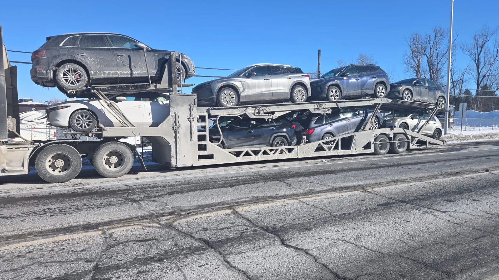 Vehicle being loaded for transport from Phoenix to Ottawa