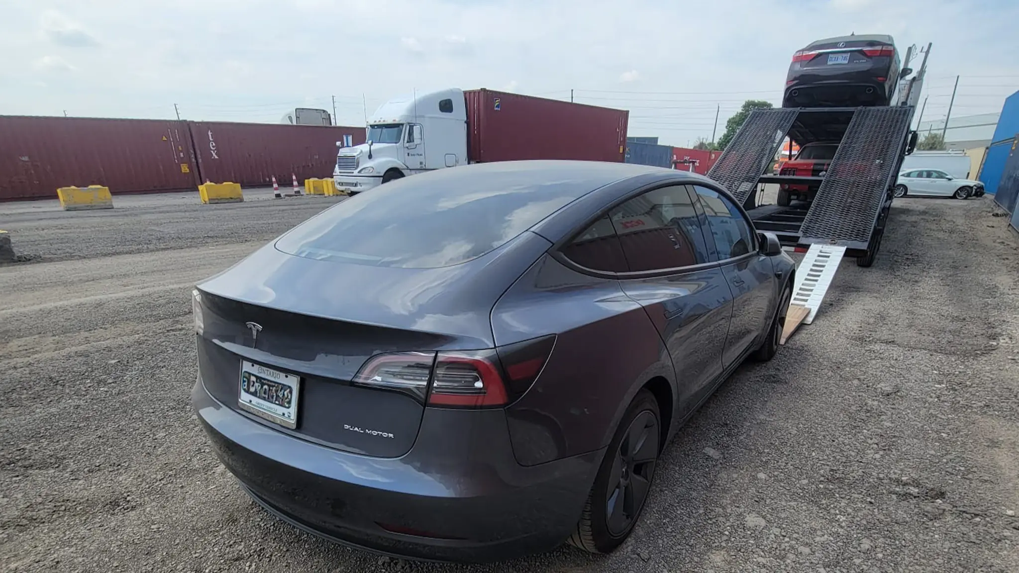 Truck transporting cars to Calgary from Quebec City