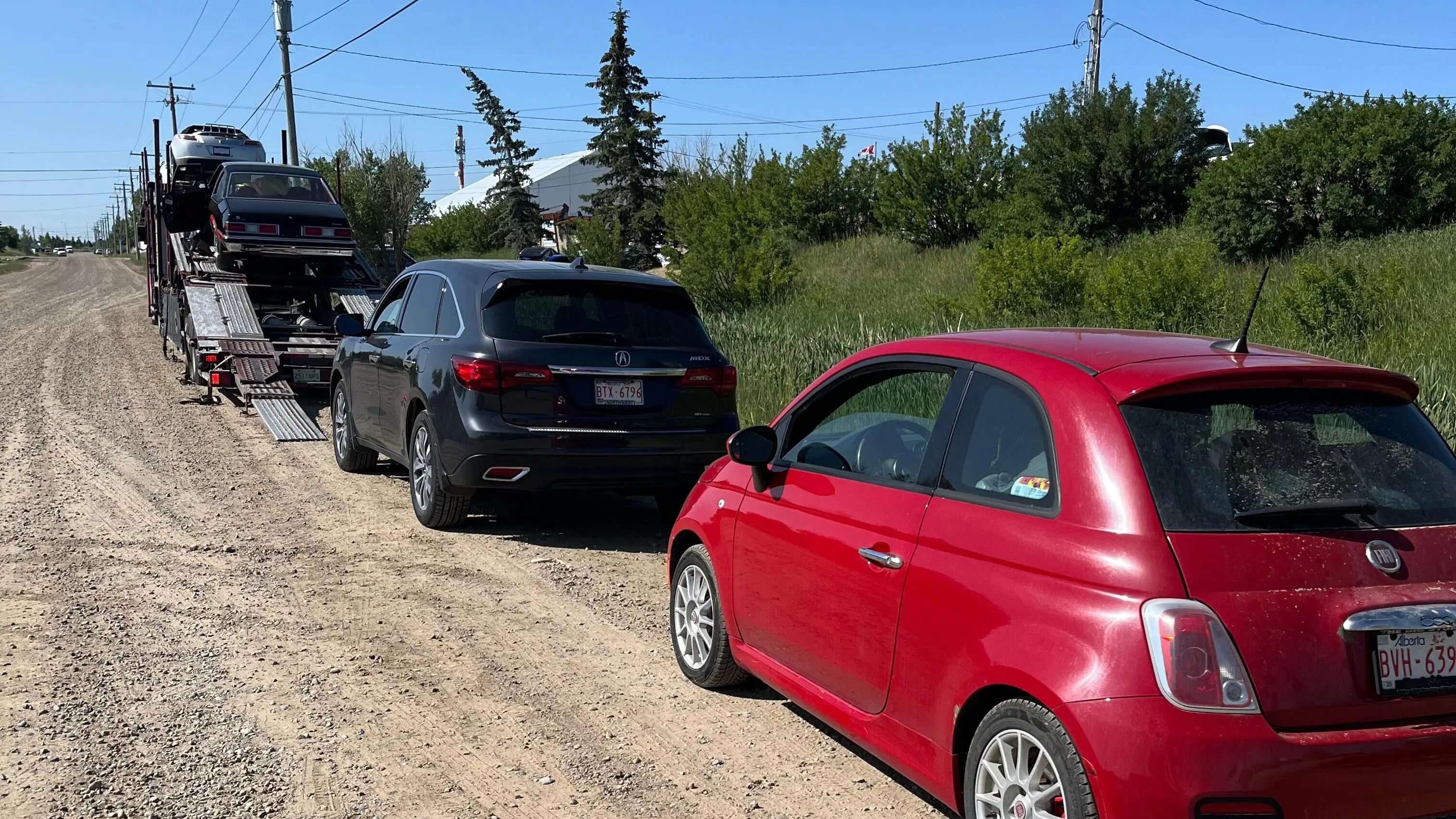Truck hauling cars from Saskatoon to Edmonton
