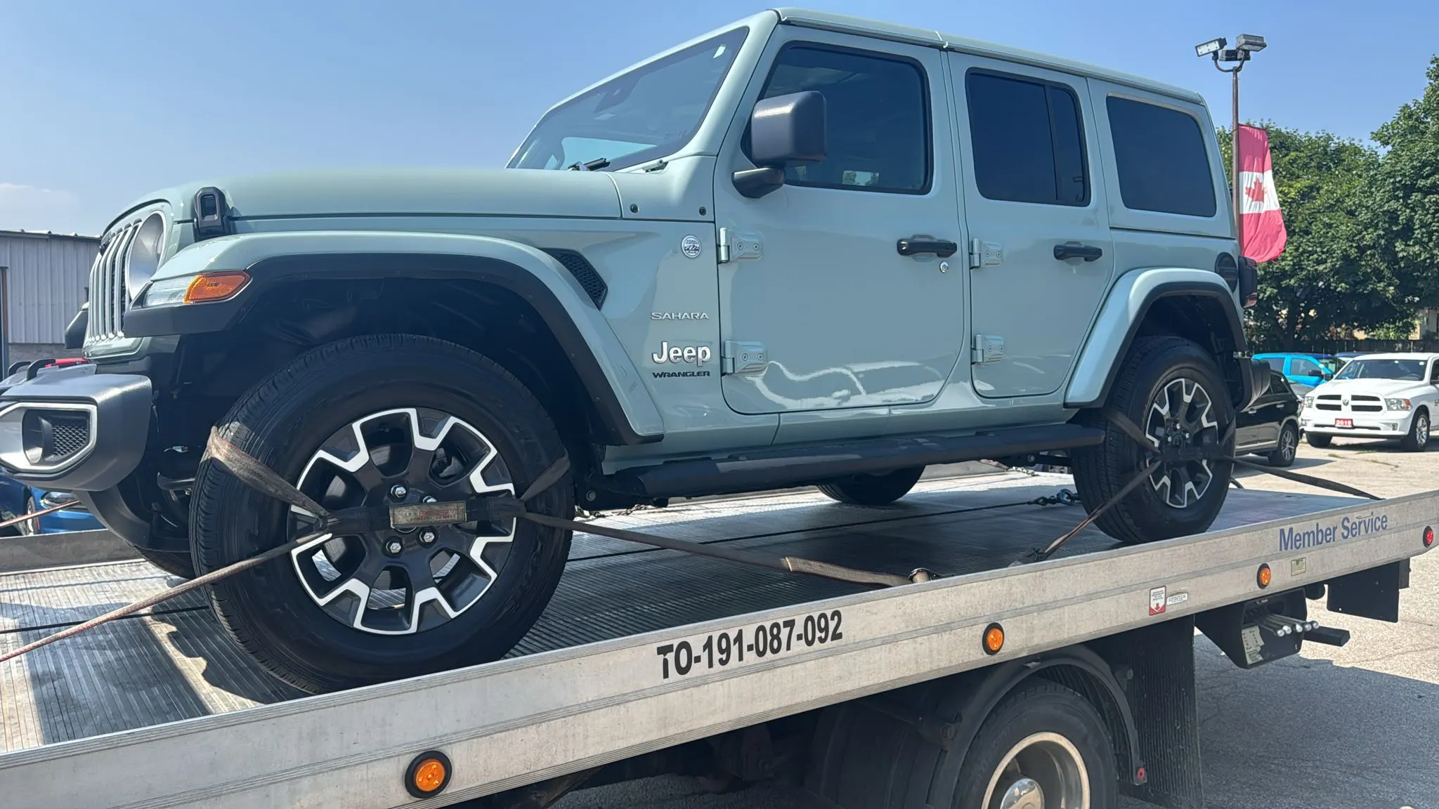 Vehicle being loaded for transport from Seattle to Ottawa
