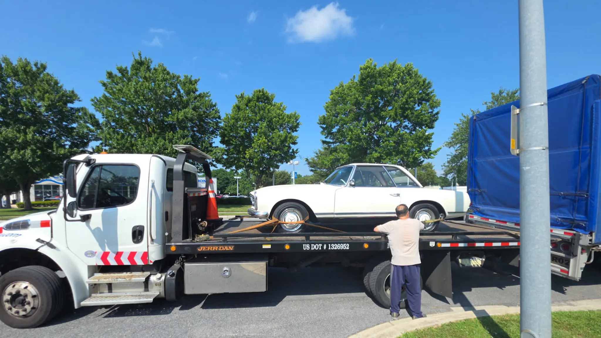 Vehicle being loaded for transport from Surrey to Burnaby