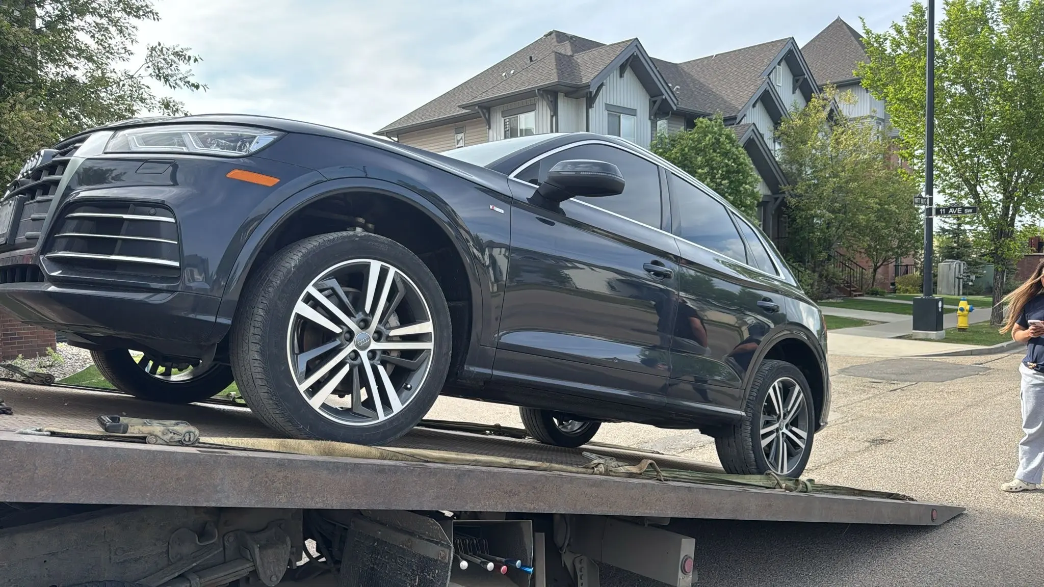 Car carrier truck driving through Ontario
