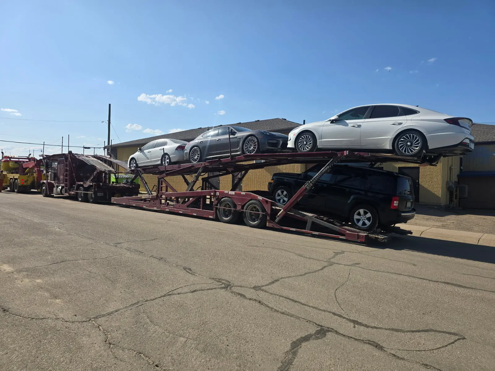 Car shipping truck headed east to St. Johns Newfoundland