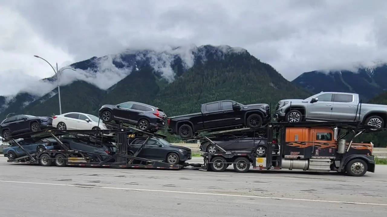 Vehicle being loaded for transport from Winnipeg to Los Angeles