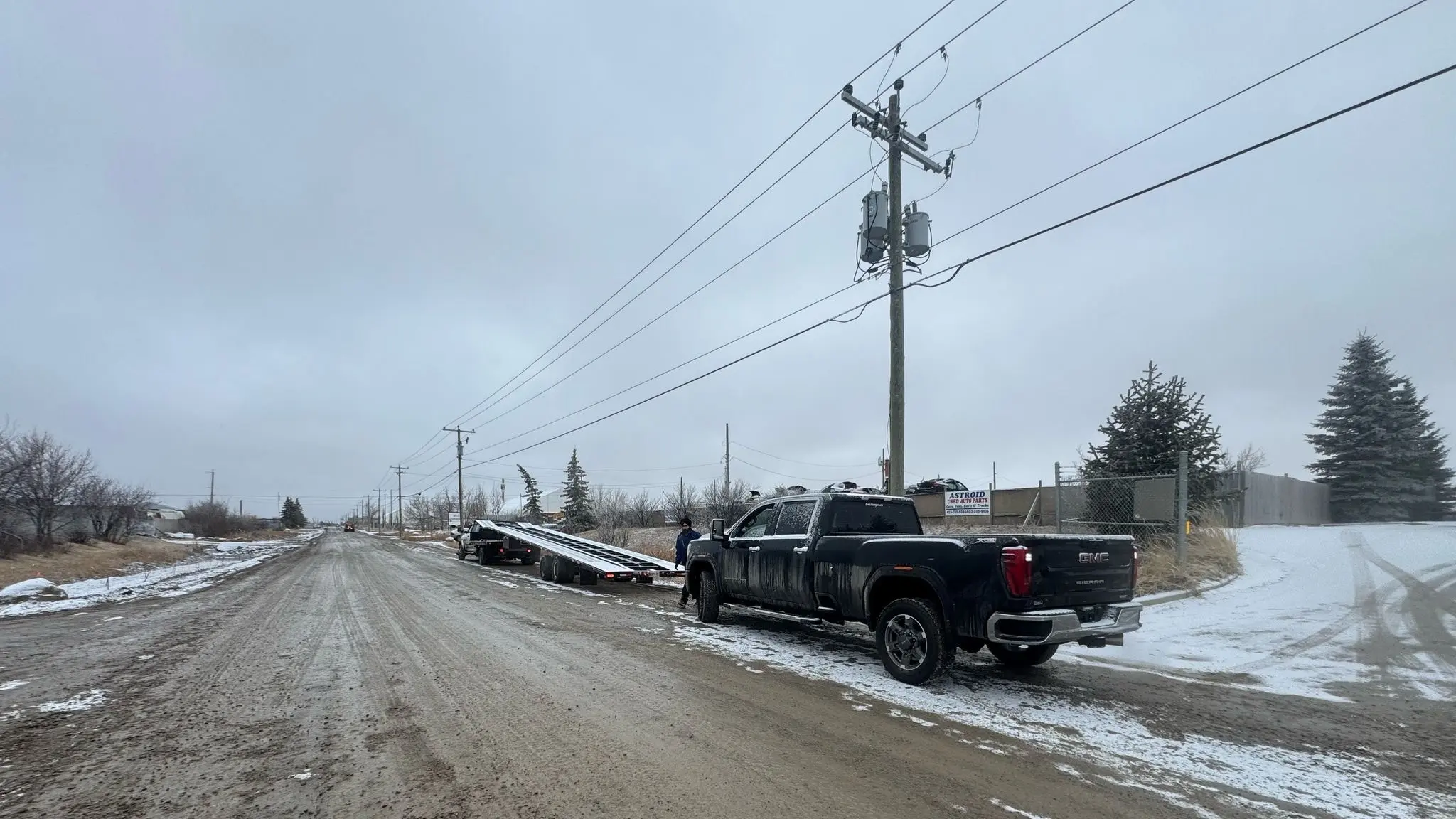 Vehicle being loaded for transport from Winnipeg to Markham