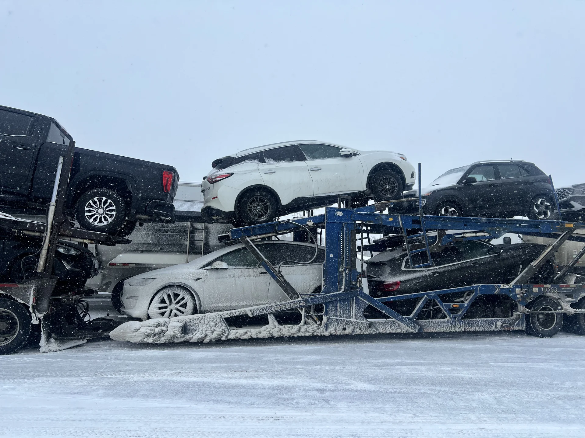 Car carrier with multiple vehicles in winter conditions